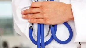 Doctor holding stetoscope